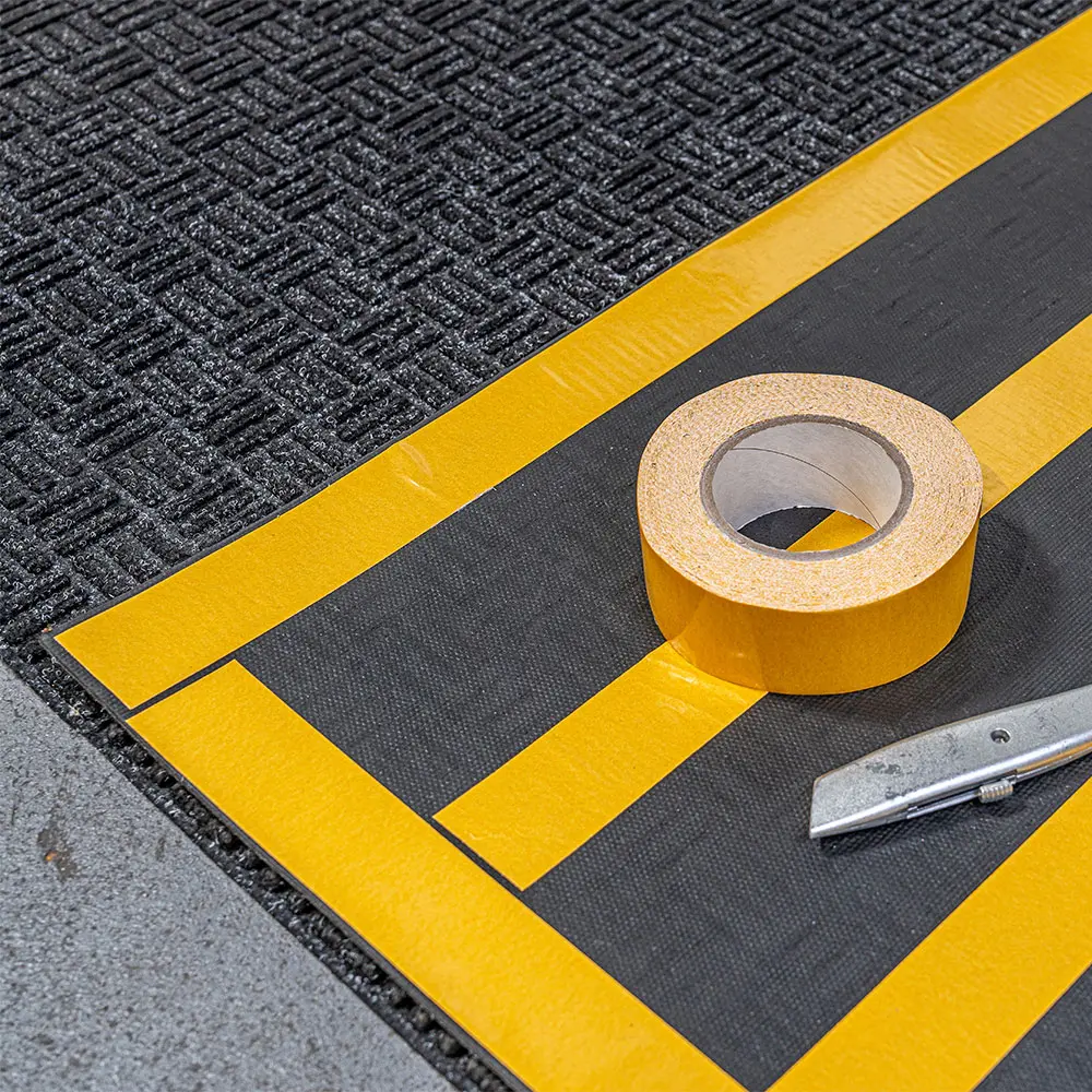 Double-Sided Adhesive Tape for Forklift Mat - 50mm x 50m White - Image 2